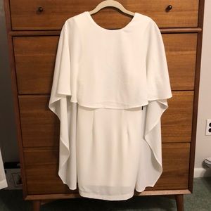 White backless dress “best is yet to come”